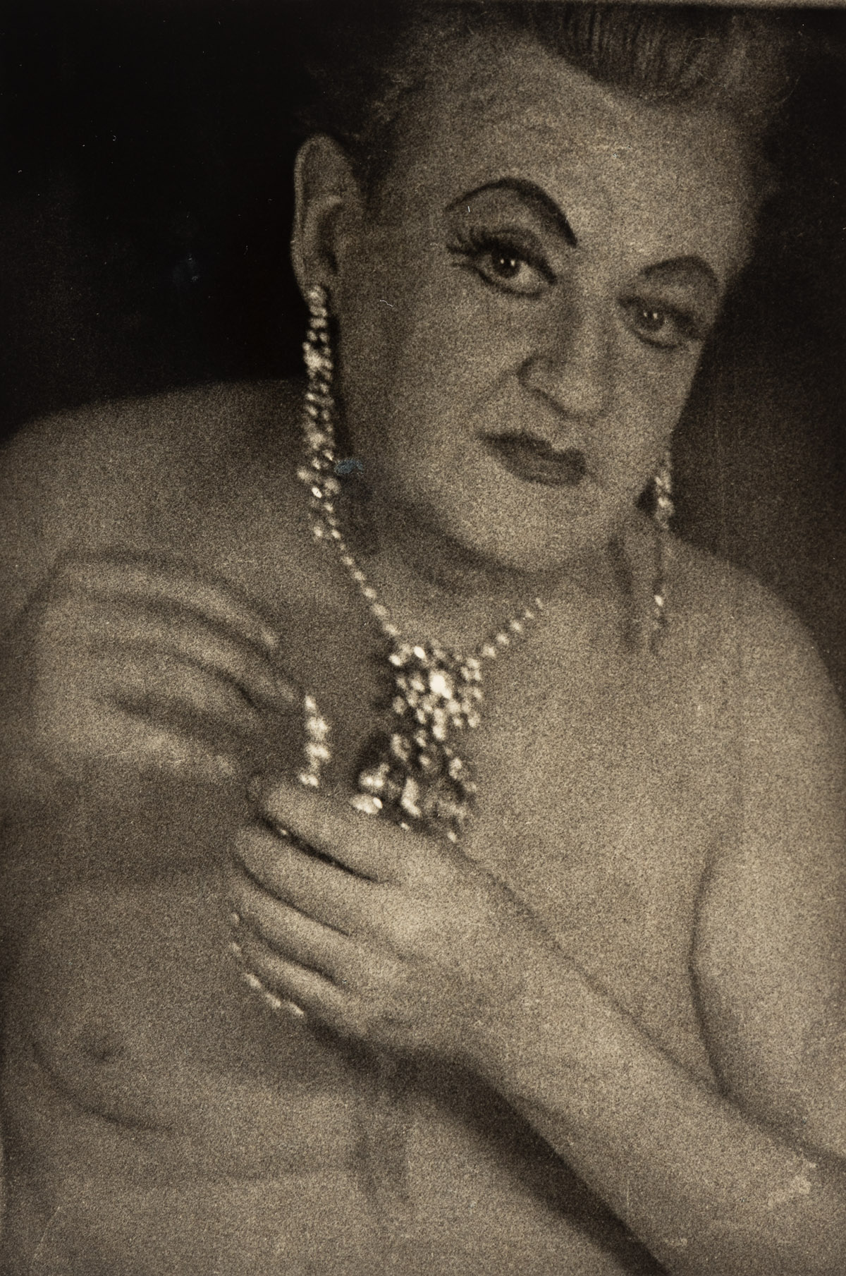 DIANE ARBUS (1923-1971) Female impersonator with jewels, N.Y.C.